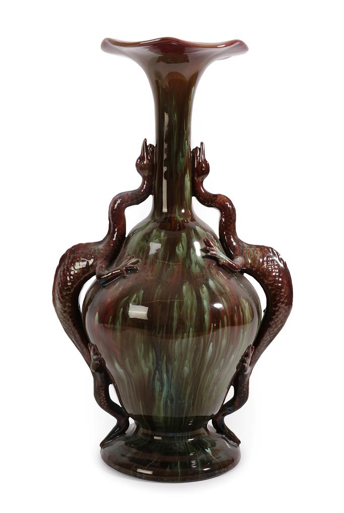 A Palissy Pottery Co. Ltd Twin-Handled Vase, the handles modelled as dragons, glazed in brown and