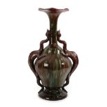 A Palissy Pottery Co. Ltd Twin-Handled Vase, the handles modelled as dragons, glazed in brown and