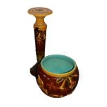 A Bretby Art Pottery Jardinière on Stand, moulded, applied and painted decoration, impressed