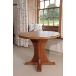 Workshop of Robert Mouseman Thompson (Kilburn): A 3ft English Oak Circular Dining Table, on a