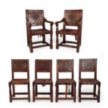 Robert Mouseman Thompson (1876-1955): A Set of Six (4+2) English Oak Panel Back Dining Chairs,