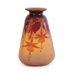An Emile Gallé Cameo Glass Vase, acid etched with fuchsia, in tones of red on an orange ground,
