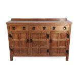 Squirrelman: Fleetham (Great Driffield): An English Oak Panelled 5ft Sideboard, with raised upstand,