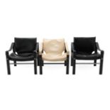 A Pair of Arkana Safari Lounge Chairs, designed by Maurice Burke, black vinyl slung seats and arm