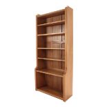 Workshop of Robert Mouseman Thompson (Kilburn): An English Oak 6ft Open Bookcase, solid ends and