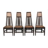 Four William Birch (High Wycombe) Arts & Crafts Tall Stained Oak Dining Chairs, the uprights forming