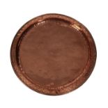 Hugh Wallis of Altrincham (1971-1943): An Arts & Crafts Circular Copper Charger, with repeating