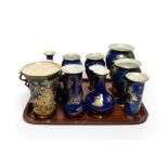 Carlton ware blue ground chinoiserie pattern lustre wares comprising various vases (12). Light