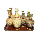 Mettlach comprising four pairs of traditional style vases, the largest pair 28cm high (8). Second