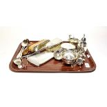 A collection of assorted silver, including a sauce boat, a sugar-caster; a pepperette, a sugar-