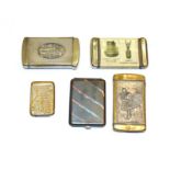 A collection of five silvered or metal advertising vesta-cases. each variously oblong or shaped