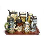 Mettlach steins including St George with a shaped dragon handle and various others (7). Overall good