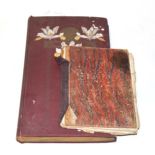 * An early 20th century postcard album, miscellaneous contents; together with a handwritten cookbook