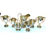 A collection of six assorted two-handled cups, variously engraved, 8.5cm high and smaller together