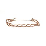 A curb link bracelet, each link stamped '9' and '.375', length 20cm . Gross weight 14.8 grams.