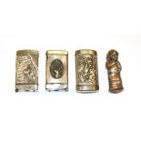 A collection of four silvered or metal Vesta-Cases, one with cigar cutter, three oblong, one