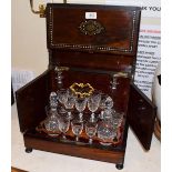 A 19th century cased liquor set