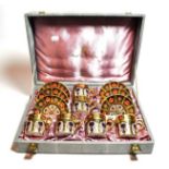 A cased set of six Royal Crown Derby Imari coffee set (one cup restored)