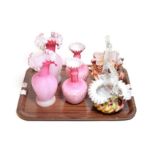 Two pairs of 19th century pink satin glass vases and a pair of coloured Nailsea glass baskets