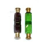 Two double-ended glass scent-bottles, one in amethyst coloured glass, with a silvered screw cover at