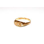 An 18 carat gold diamond ring, finger size P. Gross weight 2.6 grams.