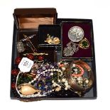 A collection of jewellery including a cultured pearl necklace, beaded necklaces, an enamel brooch,