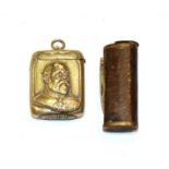 A Victorian leather covered metal vesta case, compressed tubular, with hinged cover and hinged