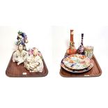 A selection of oriental ceramics including Japanese Imari plates, two vases, bisque Japanese rocking