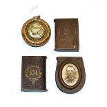 Three Vulcanite vesta-cases, two book shaped, one with the bust of Queen Victoria and the other with