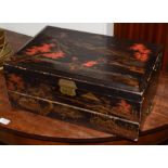 An Oriental chinoiserie lacquered travelling writing slope