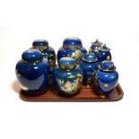 Carlton ware blue ground chinoiserie pattern lustre wares comprising four various ginger jars and