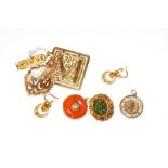 Two pendants, stamped '22CT', a square openwork plaque, stamped '22CT', a pair of drop earrings,
