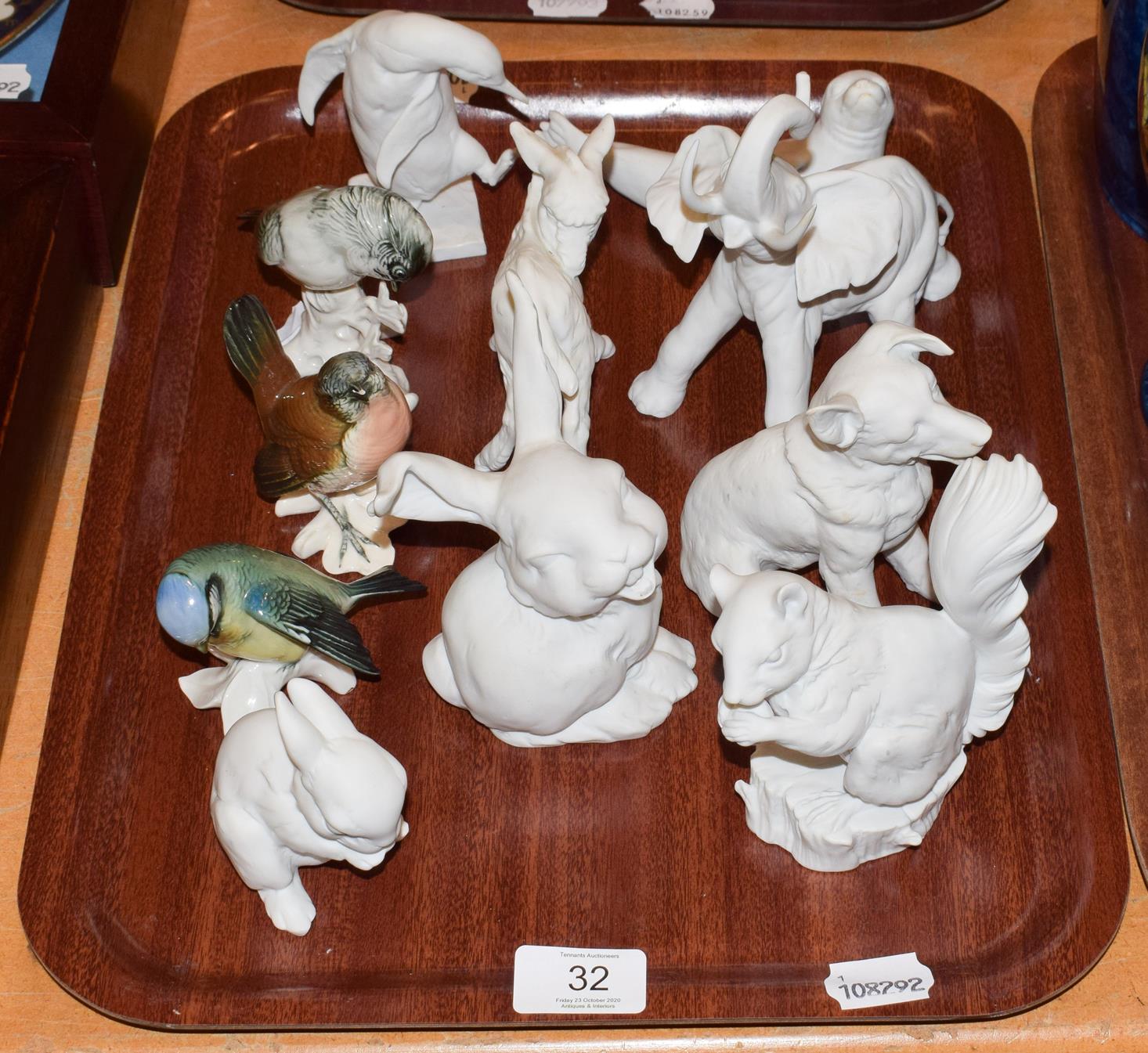 A quantity of white matte Kaiser animals including an elephant, squirrel and rabbit together with