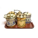 Mettlach biscuit barrels and covers with traditional decoration, painted mounts and lids,
