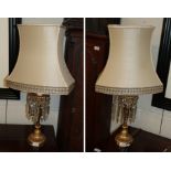 A pair of Empire style gilt metal lustre table lamps with shades