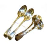 A pair of Victorian silver fiddle thread pattern table spoons, by George Adams, London, 1872,