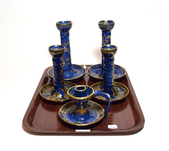 Carlton ware blue ground chinoiserie pattern lustre wares comprising two pairs of candlesticks and a