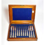 A cased set of twelve Victorian silver plate fruit-eaters, Maker's mark JD&S, possible for James
