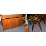 A dining room cabinet with chrome edging and a glass top circular dining table (2)