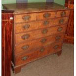 A George III oak five-height chest of drawers