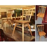 Four spindle-back dining chairs, the seats stamped to the underside BS H1 1960 2056