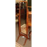 A walnut cheval mirror