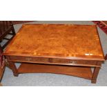 A burr walnut veneered two-drawer rectangular form coffee table