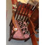 A 1920s/30s oak adjustable lounge chair and a set of five bells (2)