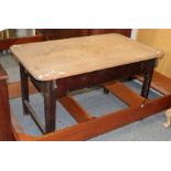 * A Victorian pine-top kitchen table with single drawer and painted legs, 125cm wide