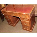 A small Edwardian mahogany pedestal desk