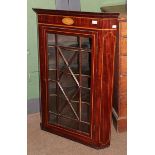 A George III inlaid mahogany straight front hanging corner cupboard with astragal glazed door