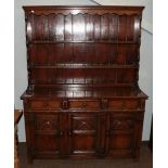 A Titchmarsh & Goodwin style oak dresser and rack