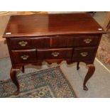 A 20th century mahogany lowboy, 88cm by 45cm by 84cm high