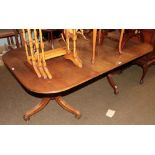 A 19th century mahogany D-end dining table with a single leaf raised on twin tripod pedestals, 185cm